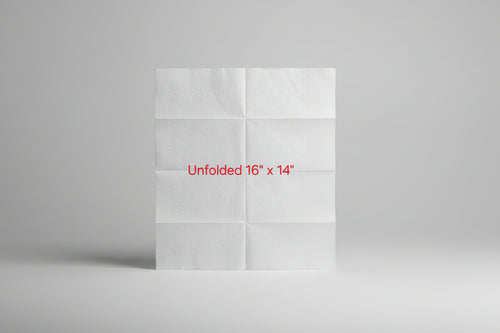 Unfolded white paper towel sheet on a brown surface with text indicating size.